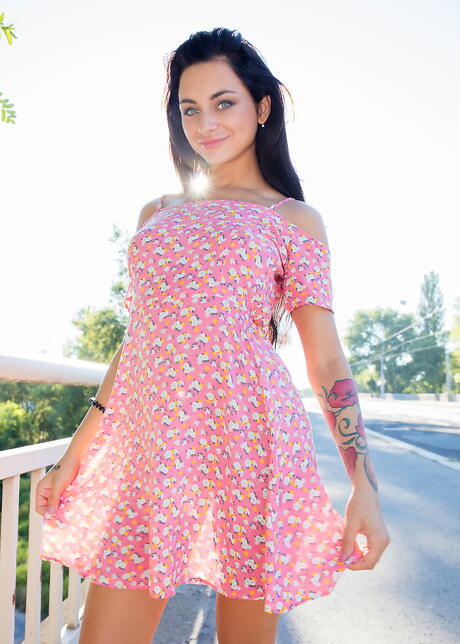 Rangy dark hair teen Dominika Dark in skirt exhibiting her ass and loving sex toy outdoor