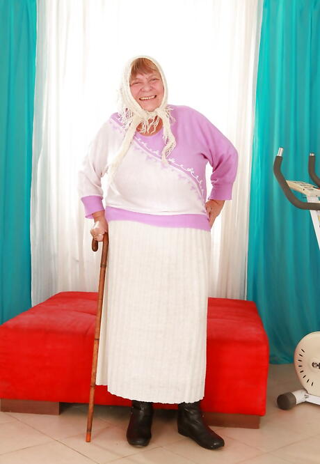 Curious granny Sara G in sexy posing gallery